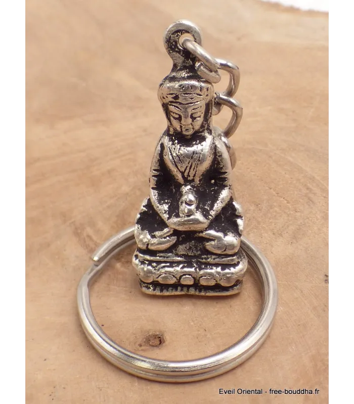 Porte-clé Bouddha en métal blanc, origine Népal - Artisanat tibétain bouddhiste