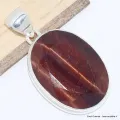 Pendentif bijou oval Oeil de Taureau facetté - Pendentifs pierres naturelles