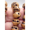Mala tibétain 108 perles brunes tête de mort impermanence Mala tibétain 108 perles MTTM3