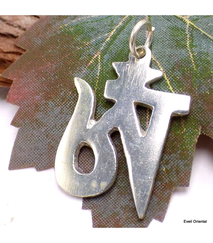 Pendentif tibétain avec le symbole OM Bijoux tibetains bouddhistes ref 2342