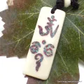Collier tibétain OM Yeux du Bouddha - Colliers tibétains et népalais