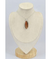 Pendentif oval en bois pétrifié 
