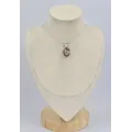 Petit Pendentif oval en bois pétrifié - Bijoux en Bois pétrifié