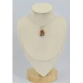 Petit Pendentif en bois pétrifié - Bijoux en Bois pétrifié