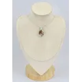 Pendentif oval bois fossilisé - Bijoux en Bois pétrifié