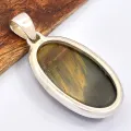 Pendentif oval en Oeil de Faucon - Pendentifs pierres naturelles