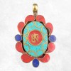 Pendentif tibétain bouddhiste Om tibétain laiton