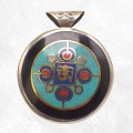 Pendentif tibétain réversible avec symboles bouddhistes, fabriqué au Népal.