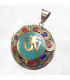 Pendentif orné du Om tibétain couleur turquoise