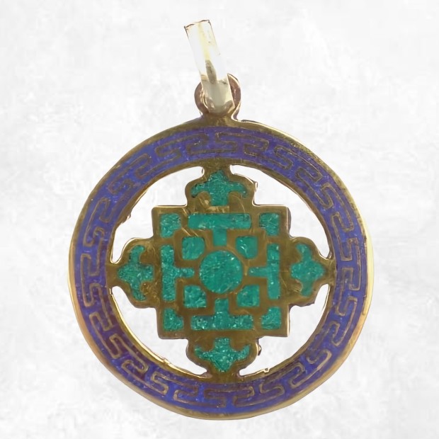 Pendentif Kalachakra turquoise et lapis-lazuli en métal jaune.