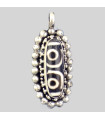 Pendentif tibétain Dzi – Bijou artisanal en métal et os de Yak