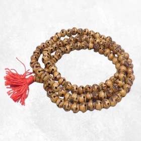 Mala tibétain 108 perles brunes tête de mort impermanence