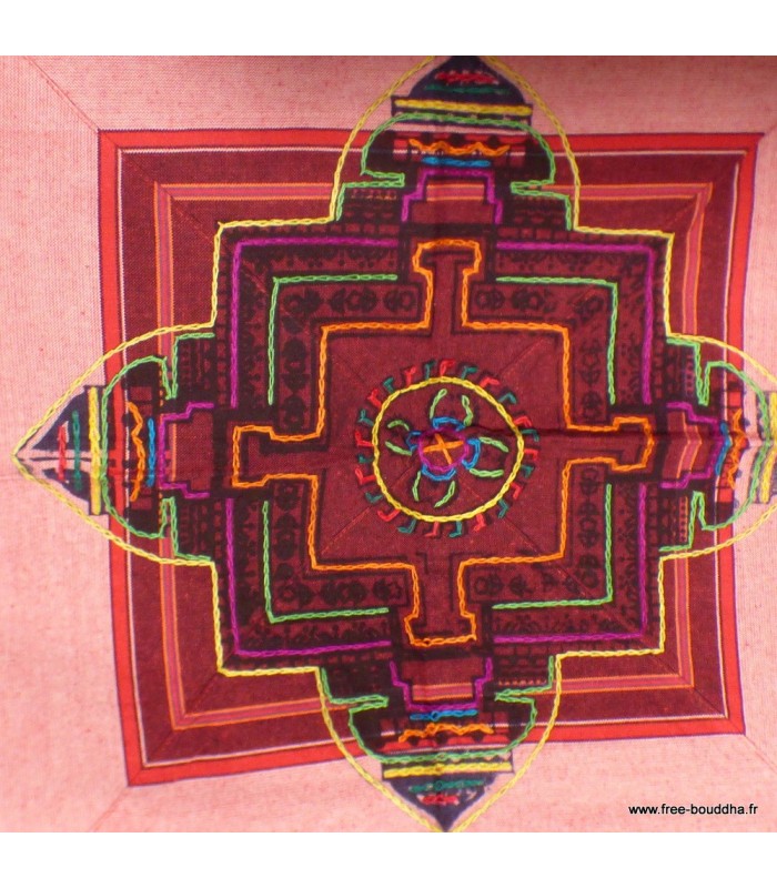 Nappe tibétaine artisanale aux symboles bouddhistes.