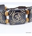 Bracelet bouddhiste en os de buffle gravé main Om.