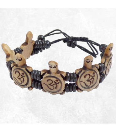 Bracelet tibétain artisanal en os de buffle sculpté main.