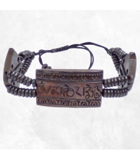 Bracelet tibétain artisanal en os de buffle sculpté main.