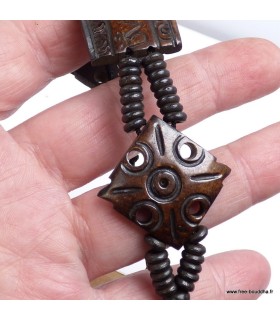 Bracelet bouddhiste artisanal en os de buffle sculpté main.