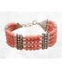 Bracelet tibétain en perles de corail rose et métal blanc.