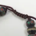 Bracelet porte-bonheur noir en os et pierres – 27 perles – Népal