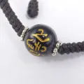 Bracelet tibétain porte-bonheur fil noir et mantra - Bracelets tibétains bouddhistes
