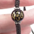 Bracelet tibétain porte-bonheur fil noir et mantra - Bracelets tibétains bouddhistes