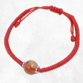 Bracelet porte-bonheur fil rouge et Cornaline - Bracelets tibétains bouddhistes