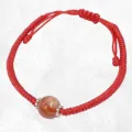 Bracelet porte-bonheur fil rouge et Cornaline - Bracelets tibétains bouddhistes