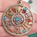 Pendentif tibétain Dordjé signes auspicieux métal ajouré - Pendentifs tibétains bouddhistes
