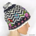 Bonnet à pompon zigzag gris et blanc brodé de fleurs - Bonnets en laine du Népal