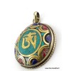 Pendentif orné du Om tibétain couleur turquoise Bijoux tibetains bouddhistes ABT24.1
