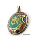 Pendentif orné du Om tibétain couleur turquoise Bijoux tibetains bouddhistes ABT24.1