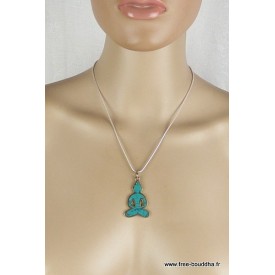 Pendentif Bouddha en laiton et turquoise, fabriqué au Népal.