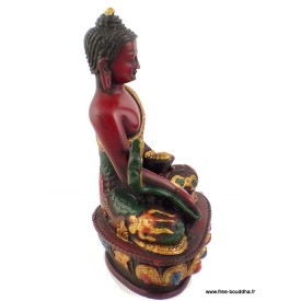 Statuette Bouddha en résine rouge peinte à la main.