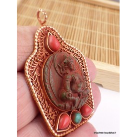 Pendentif Bouddha antique en métal vieilli avec pierres.