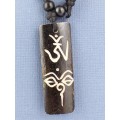 Collier tibétain Om et Yeux du Bouddha Bijoux tibetains bouddhistes WN31