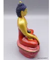 Statue Bouddha Sakyamouni résine rouge et or - Objets rituels bouddhistes