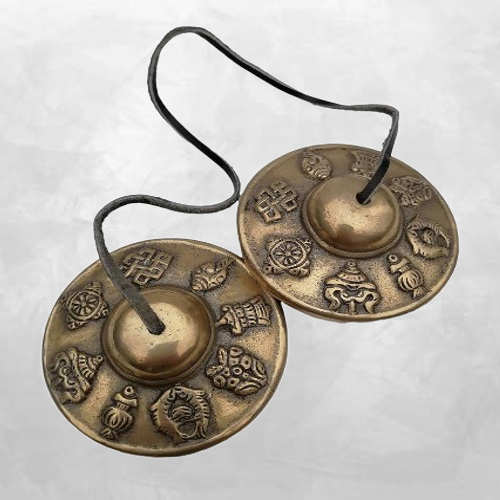 tingshas cymbales tibétaines avec signes auspicieux